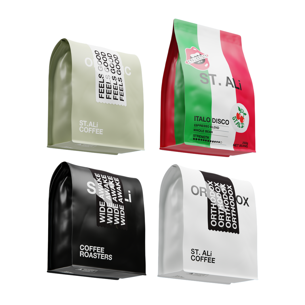 4 coffee bags lined up of ST. ALi Feels Good, Orthodox, Wide Awake and Italo Disco blends, each 250 grams