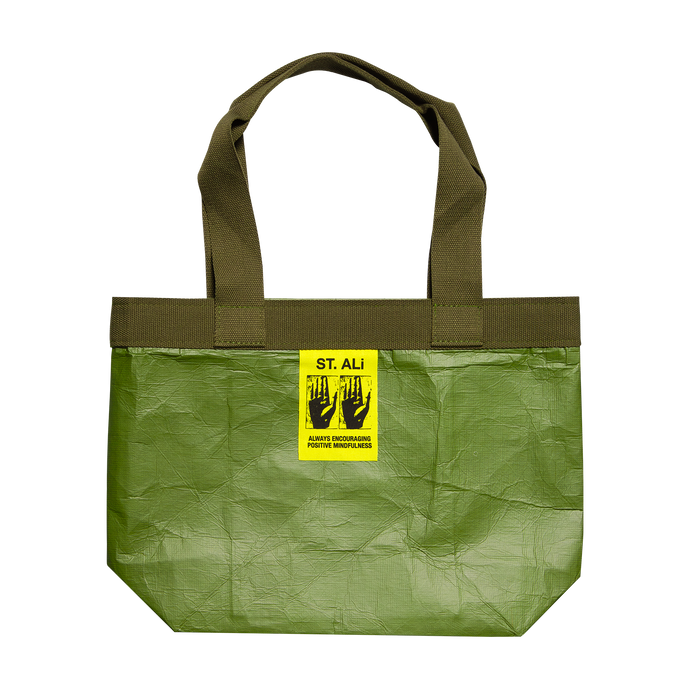 Green tote back with yellow ST. ALi tag
