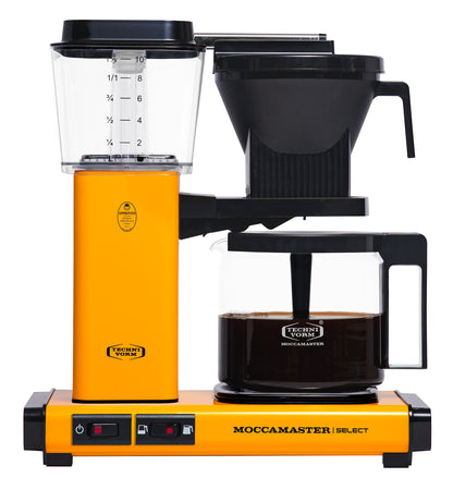 Moccamaster brewer with coffee in yellow