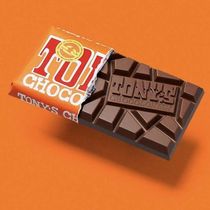 Tony's Chocolonely caramel chocolate  coming out of orange packet